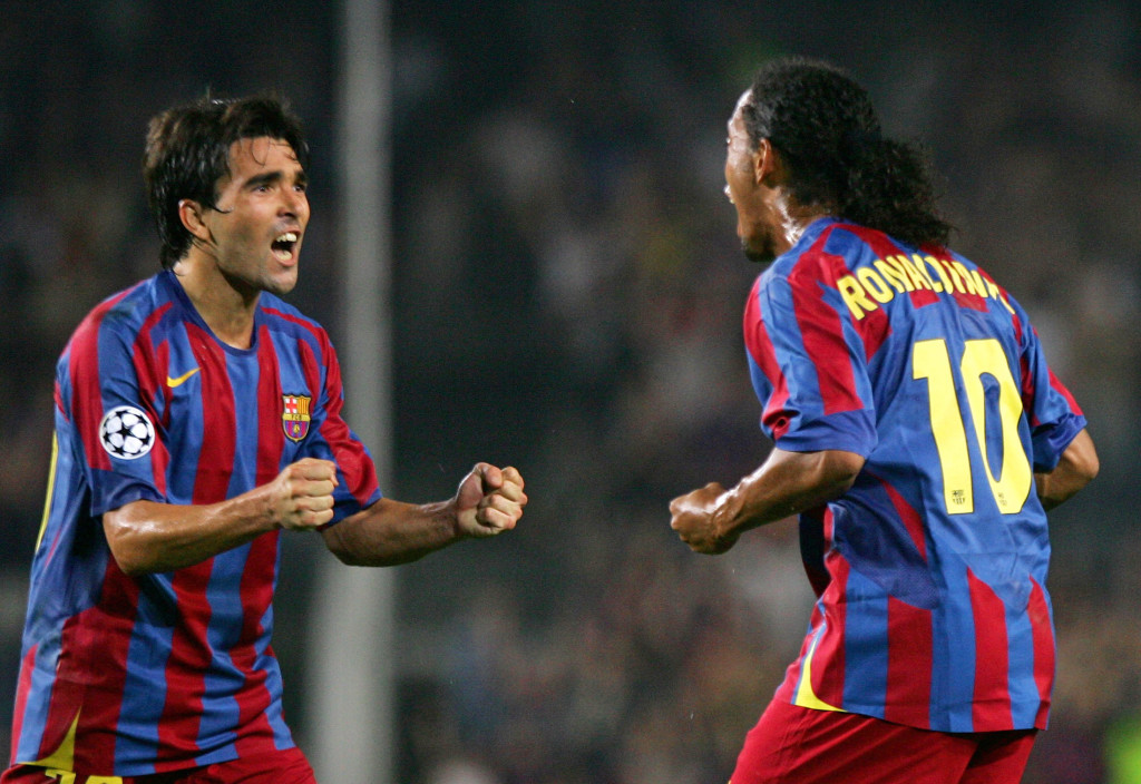 Barcelona's Deco celebrates with team mate Ronaldinho after scoring the third goal against Udinese during their Champions League soccer match in Barcelona