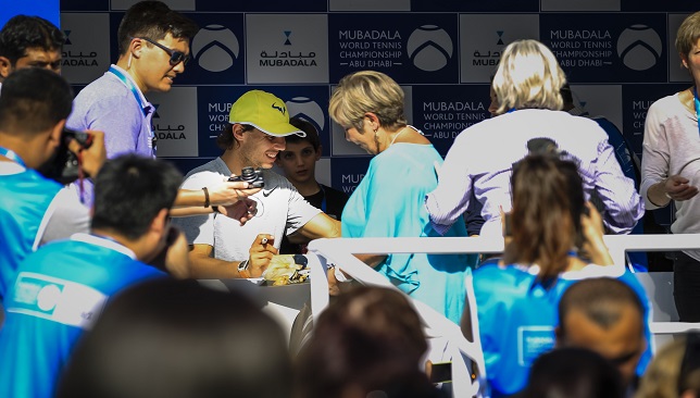 Nadal signs autographs in Tennis Village
