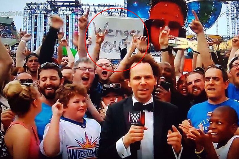A-Wenger-Out-sign-appears-at-Wrestlemania-33