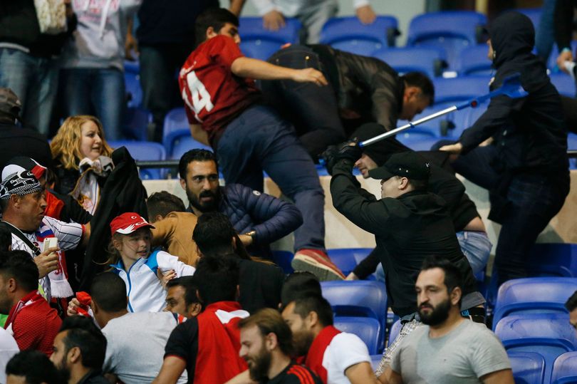 Besiktas-and-Lyon-fans-clash-in-the-stands