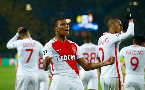 Monacos-Kylian-Mbappe-Lottin-celebrates-scoring-their-third-goal-with-team-mates