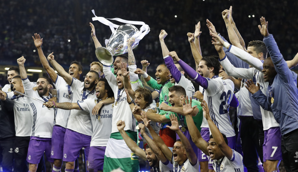 Real Madrid's Sergio Ramos celebrates with the trophy after winning the UEFA Champions League Final