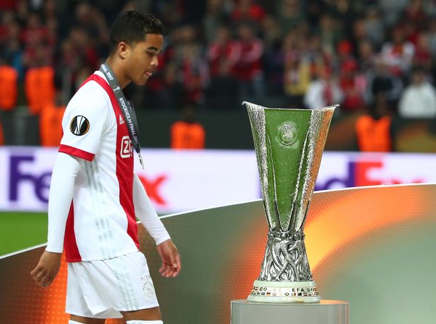 Ajaxs-Justin-Kluivert-looks-dejected-as-he-walks-past-the-trophy-after-the-match