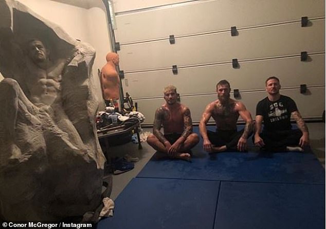 4391700-6184615-Conor_McGregor_uploaded_a_photo_showing_him_in_training_alongsid-a-63_1537357362270