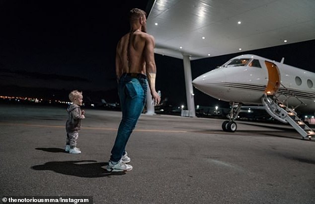 10548490-6768493-Conor_McGregor_posted_a_picture_of_him_with_his_son_Conor_jnr_in-a-6_1551695989480