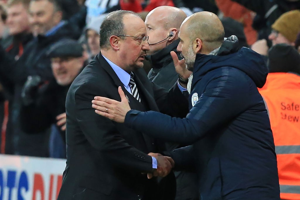 Newcastle United's Spanish manager Rafael Benitez (L) shakes hands with Manchester City's Spanish manager Pep Guardiola (R) after the English Premier League football match between Newcastle United and Manchester City at St James' Park in Newcastle-upon-Tyne, north east England on January 29, 2019. - Newcastle won the game 2-1. (Photo by Lindsey PARNABY / AFP) / RESTRICTED TO EDITORIAL USE. No use with unauthorized audio, video, data, fixture lists, club/league logos or 'live' services. Online in-match use limited to 120 images. An additional 40 images may be used in extra time. No video emulation. Social media in-match use limited to 120 images. An additional 40 images may be used in extra time. No use in betting publications, games or single club/league/player publications. /         (Photo credit should read LINDSEY PARNABY/AFP via Getty Images)