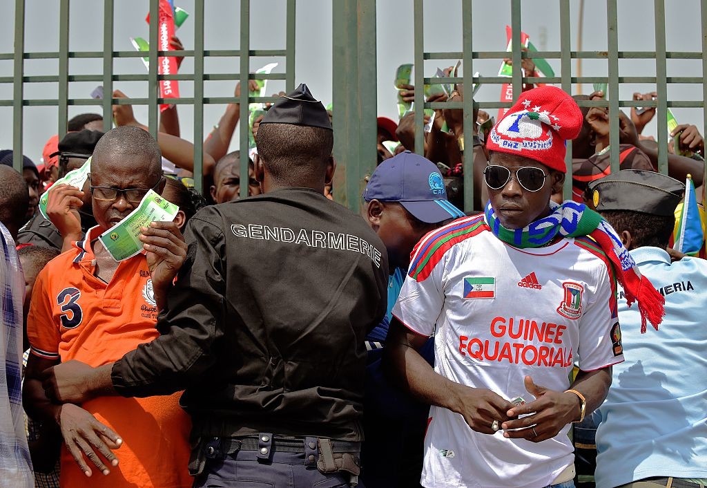 Guinean football fans arrive at Bata Stadium ahead of the 2015 African Cup of Nations group A football match between Equatorial Guinea and Congo in Bata on January 17, 2015. AFP PHOTO / CARL DE SOUZA        (Photo credit should read CARL DE SOUZA/AFP via Getty Images)